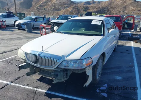 2010 Lincoln Town Car Signature Limited из США, поврежденный, VIN 2LNBL8CV4AX610956